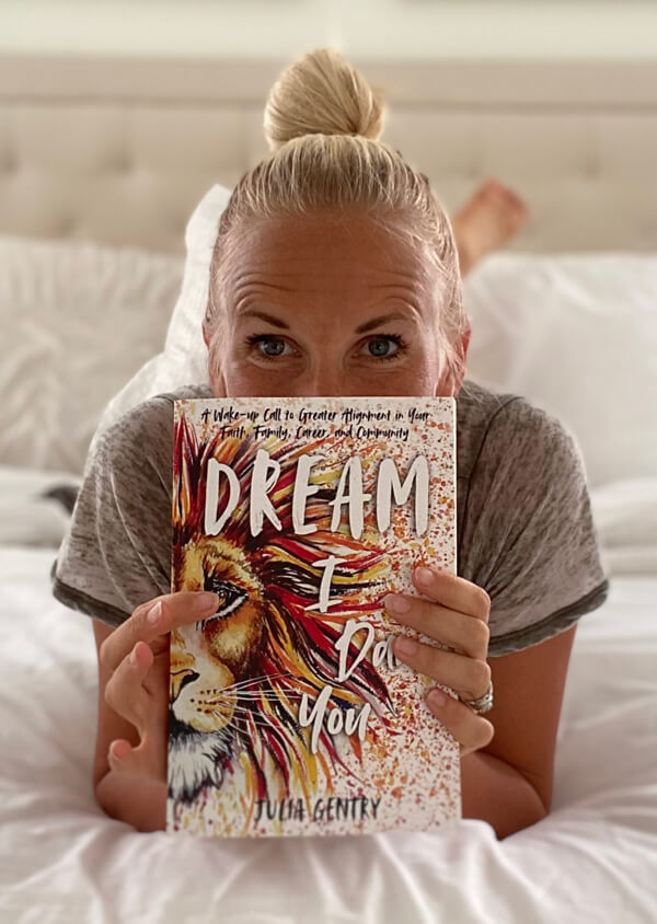 Julia Gentry holding DREAM - I Dare You book